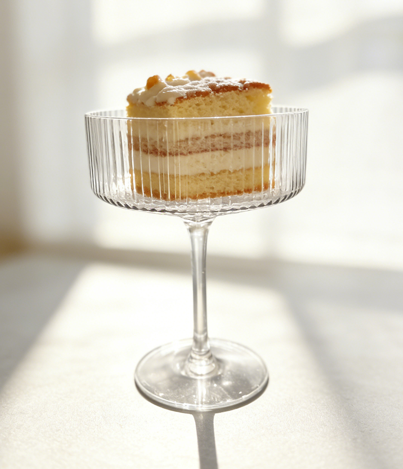 Plastic coupe glass used as dessert cake stand display elegant event